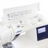Masina de cusut de uz casnic, controlata de computer, cu afisaj LCD luminos, functie de taiere automata a firului si 180 de modele, inclusiv un font de litere. JUKI HZL-G220